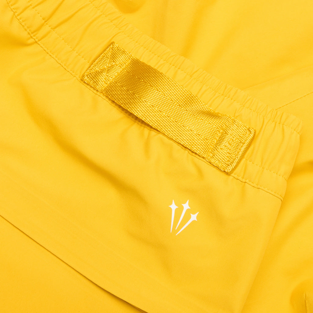 Nocta X LArt Tech Pants Vivid Sulfur Sail